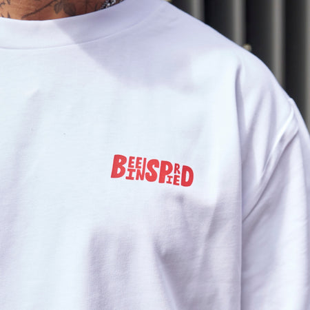 Aguirre Long Sleeve T-Shirt in white and burnt red, focusing on a print on the chest and back