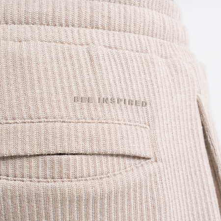 Bee Inspired Ake Short in Clay, relaxed fit shorts with subtle branding, close-up