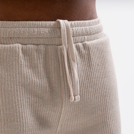 Bee Inspired Ake Short in Clay, relaxed fit shorts with subtle branding, back view