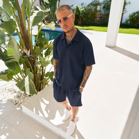 Bee Inspired Ake Shirt in Dark Navy, short sleeve shirt with a classic camp collar, styled shot