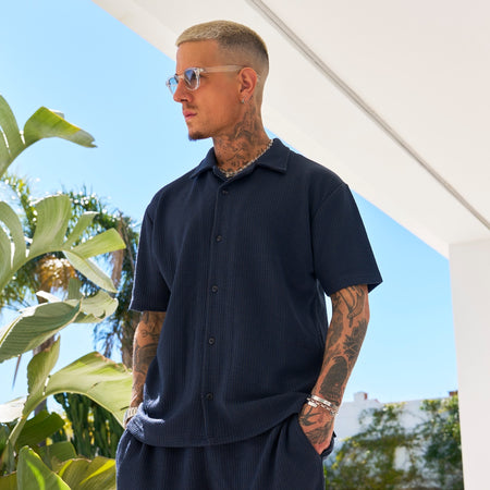 Bee Inspired Ake Shirt in dark navy, relaxed fit with a camp collar and short sleeves