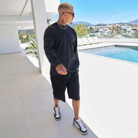 Bee Inspired Alonso Long Sleeve Top in Faded Black, relaxed fit long sleeve graphic tee with a faded wash, styled shot