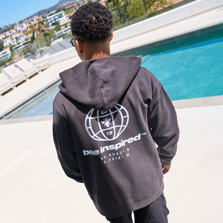 Bee Inspired Mata Full Zip Hoodie in Faded Black, relaxed fit full zip hoodie with a graphic print, front view