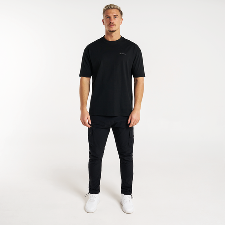 Bee Inspired Diallo T-Shirt in Black, relaxed fit tee designed for easy layering, styled shot