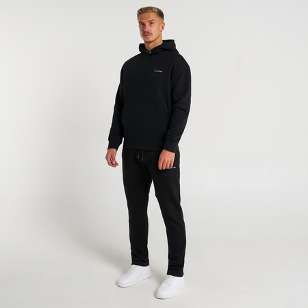 Bee Inspired Diallo Hoodie in Black, relaxed fit hoodie designed for easy layering, styled shot