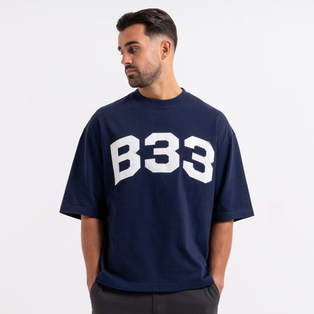 Bee Inspired Figo T-Shirt in Navy, heavyweight cotton tee with a large twill fabric appliqu\u00e9, styled shot