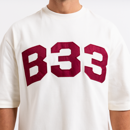 Bee Inspired Figo T-Shirt in Off White, heavyweight cotton tee with a large twill fabric appliqu\u00e9, styled shot