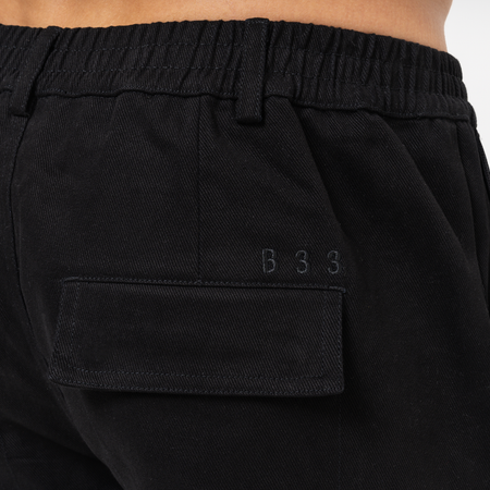 Bee Inspired Foden Cargo Pant in Black, cotton twill cargo trousers with front pockets and back branding, front view