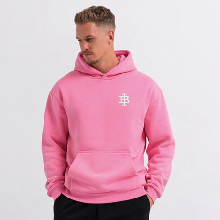 Bee Inspired Guedes Hoodie in Bubblegum Pink, hoodie with a clean embroidered BI monogram graphic, close-up crop shot