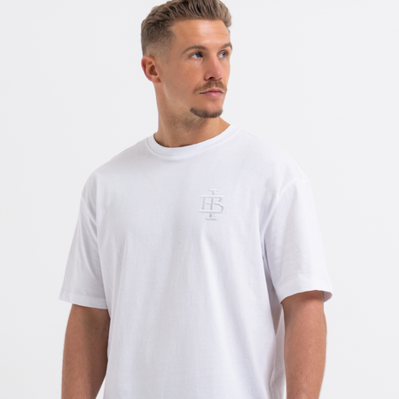 Bee Inspired Guedes T-Shirt in White/White, tee with a clean embroidered BI monogram graphic, close-up crop shot