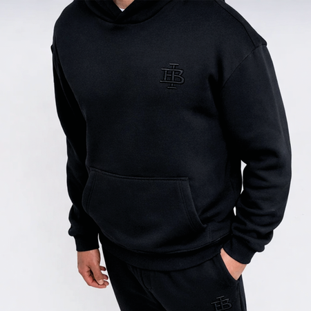 Bee Inspired Guedes Jogpant in Black, jogpants with a clean embroidered BI monogram, close-up crop shot