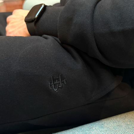 Bee Inspired Guedes Jogpant in Black, jogpants with a clean embroidered BI monogram, styled lifestyle shot