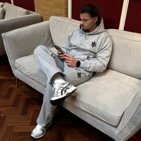 Bee Inspired Guedes Jogpant in Grey Marl, jogpants with a clean embroidered BI monogram, styled lifestyle shot