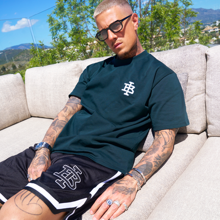 Bee Inspired Guedes Mesh Shorts in Black, breathable mesh shorts built for comfort and movement, styled shot