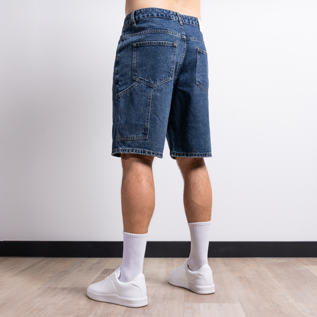 Bee Inspired Gueye Denim Short in Mid Blue, relaxed fit denim shorts with a carpenter pocket and belt loops, styled shot
