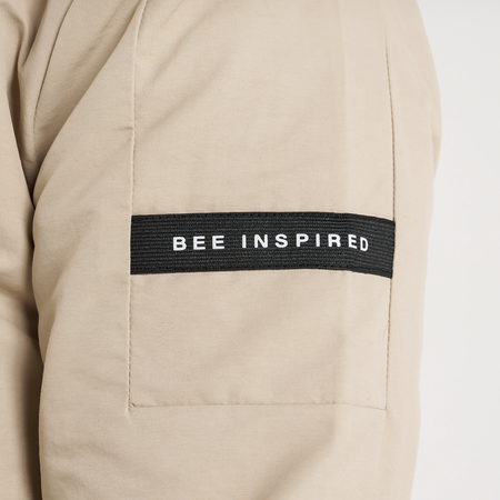 Bee Inspired Hanley Trench Coat in Sand, slim fit trench coat with a collared neck and branded snap fastenings, back view