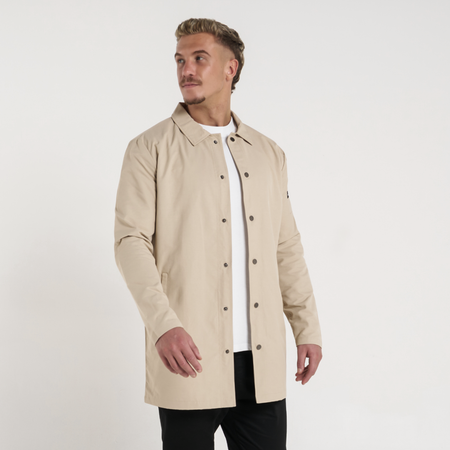 Bee Inspired Hanley Trench Coat in Sand, slim fit trench coat with a collared neck and branded snap fastenings, front view