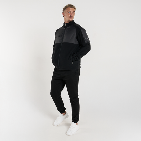 Bee Inspired Hart Zip Through in Black, relaxed fit zip-through fleece with cut and sew panelling, styled shot
