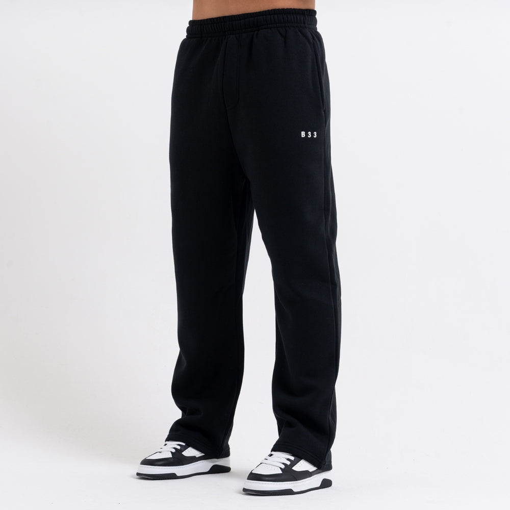 Initial Jogpant in black as part of the matching Initial tracksuit