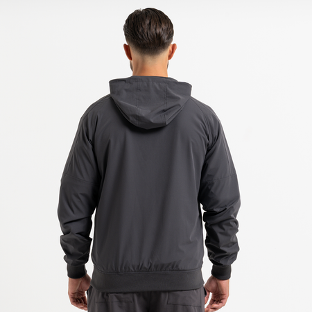 Bee Inspired Juranovic Jacket in Charcoal, lightweight jacket with adjustable hood and neckline toggles, styled shot
