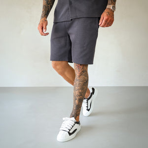 Bee Inspired Kawashima Short in charcoal, regular fit with a linear logo above the back pocket