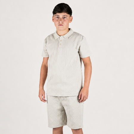 Bee Inspired Junior Konsa Twin Set in Light Stone, matching polo shirt and shorts twin set in lightweight cotton, front view