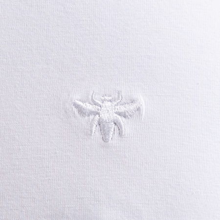 Bee Inspired Legacy T-Shirt in White, slim fit tee with subtle bee embroidery, close-up