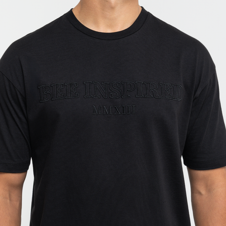 Bee Inspired Levit T-Shirt in Black, tee with embroidered branding across the chest, close-up