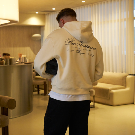 Bee Inspired Olise Hoodie in Sand, relaxed fit hoodie with stretch cuffs and hem, styled lifestyle shot