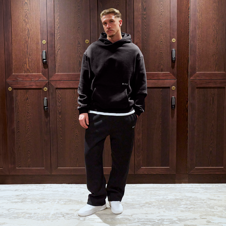 Bee Inspired Initial Hoodie in Black, relaxed fit hoodie, part of the B33 Foundations range, styled lifestyle shot