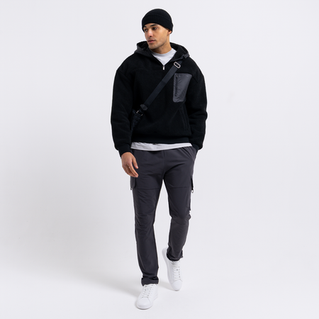 Bee Inspired Marchetti 1/4 Zip in Black, relaxed fit hooded fleece quarter-zip with panelled detailing, close-up