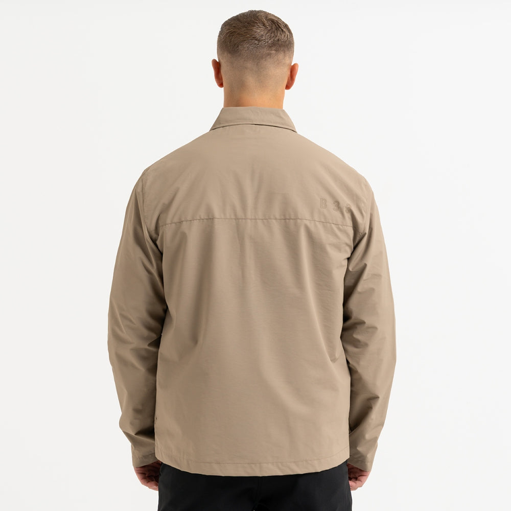 Marshall Jacket in dark sand with bold B33 branding on the upper back