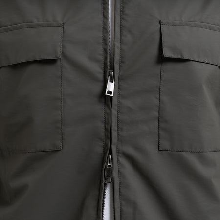 Marshall Jacket in olive, focusing on a sleek chest pocket