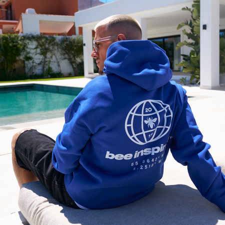 Bee Inspired Mata Hoodie in Blue, oversized hoodie with a bold rear graphic print, front view