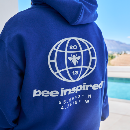Bee Inspired Mata Hoodie in Blue, oversized hoodie with a bold rear graphic print, back view