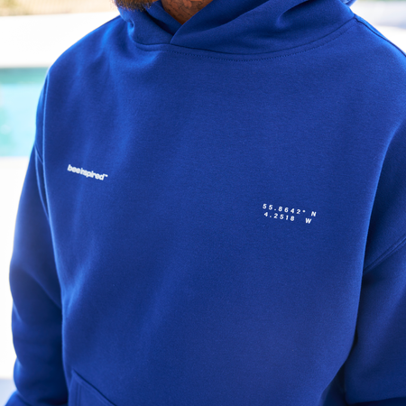 Bee Inspired Mata Hoodie in Blue, oversized hoodie with a bold rear graphic print, alternate angle