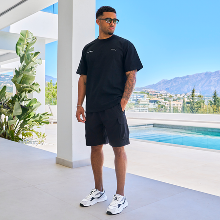 Bee Inspired Mata Oversized T-Shirt in Black, oversized tee with a bold rear graphic print, styled shot