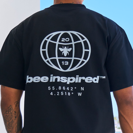 Bee Inspired Mata Oversized T-Shirt in Black, oversized tee with a bold rear graphic print, back view