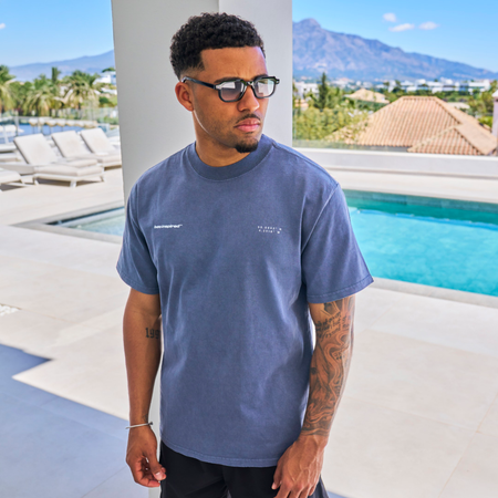 Bee Inspired Mata Oversized T-Shirt in Faded Indigo, oversized tee with a bold rear graphic print, close-up