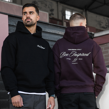 Bee Inspired Team Hoodie in Plum, hoodie in soft fleece fabric with embroidered and printed graphics, styled lifestyle shot