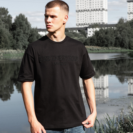 Bee Inspired Levit T-Shirt in Black, tee with embroidered branding across the chest, close-up crop shot