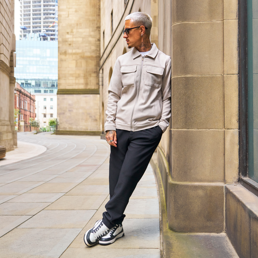 Mateta Jacket Light Stone with matching black trousers