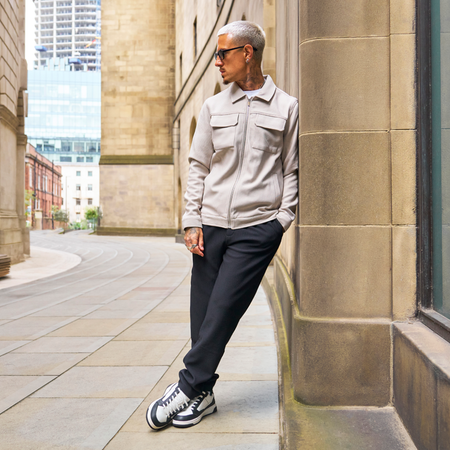 Mateta Jacket Light Stone with matching black trousers