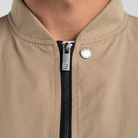 Bee Inspired Neves Longline Bomber Jacket in Sand, longline bomber jacket with a baseball style neckline and zip front