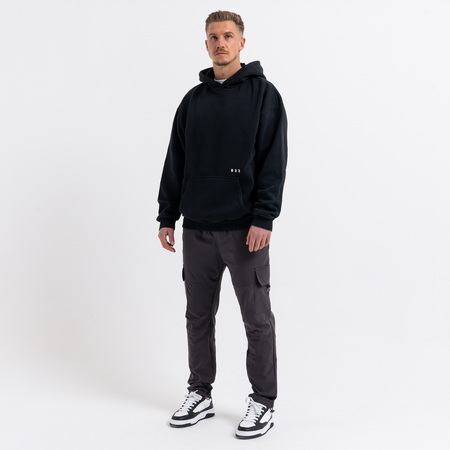 Bee Inspired Initial Hoodie in Black, relaxed fit hoodie, part of the B33 Foundations range, styled shot