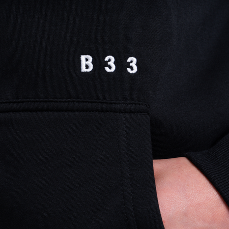 Bee Inspired Initial Zip Hoodie in Black, relaxed fit zip hoodie, part of the B33 Foundations range, close-up