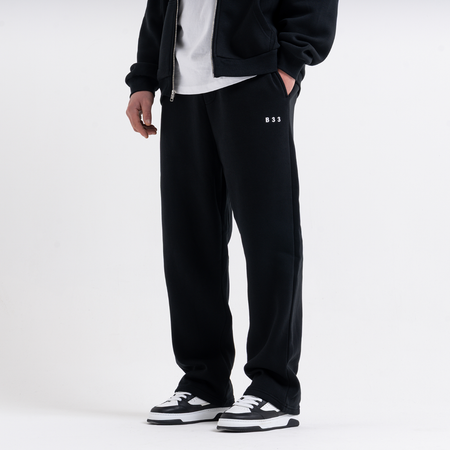 Bee Inspired Initial Jogpant in Black, relaxed fit jogpants, part of the B33 Foundations range, front view