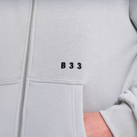 Bee Inspired Initial Zip Hoodie in Light Grey, relaxed fit zip hoodie, part of the B33 Foundations range, close-up
