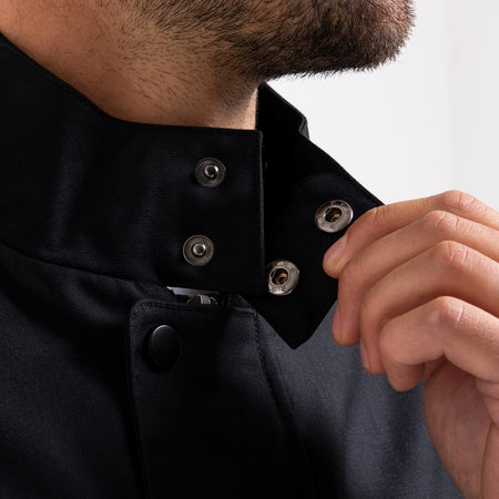 Onana Jacket in black with a funnel neck collar