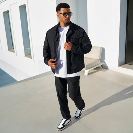 Full length view of the Onana Jacket in black